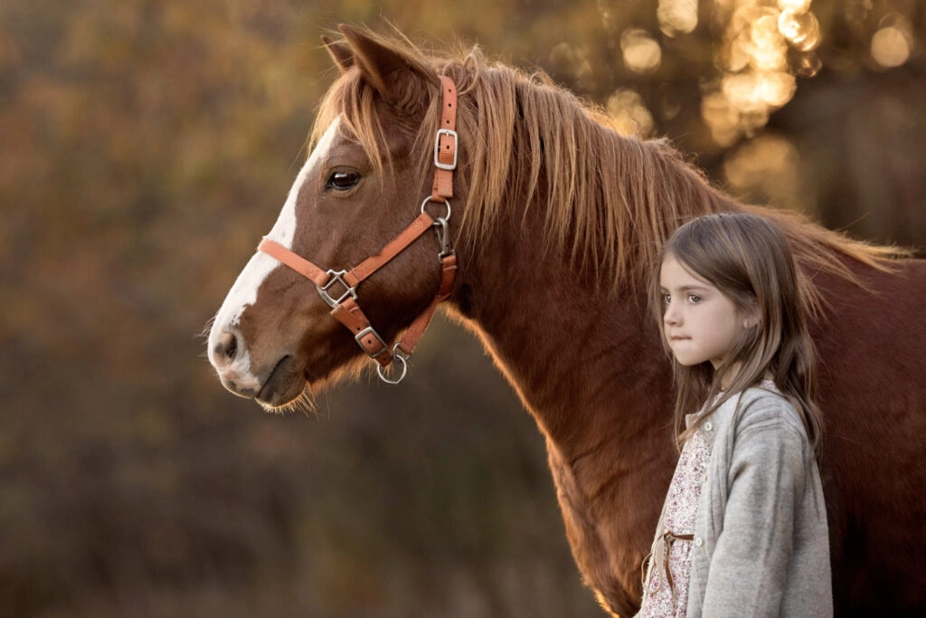 Young girl's gentle playmate- Stock and Noble