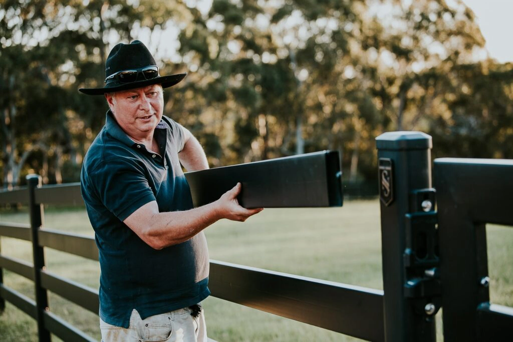 Premium steel post and rail fence by Stock & Noble