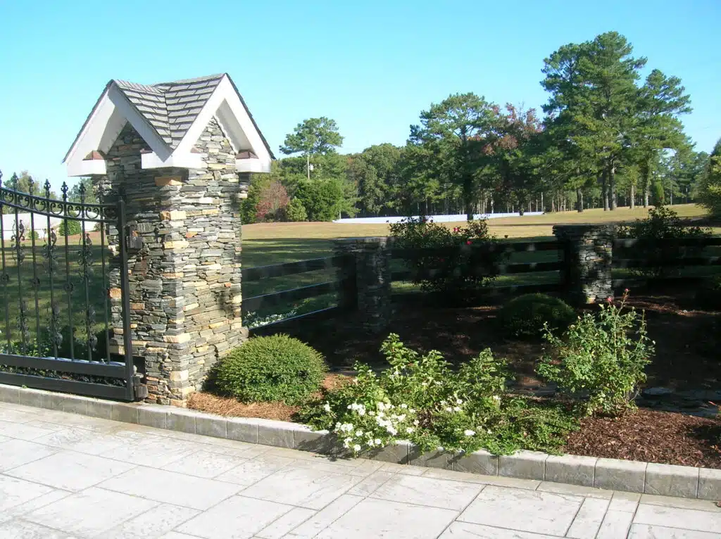 Brick pillar entry design horse fenceing