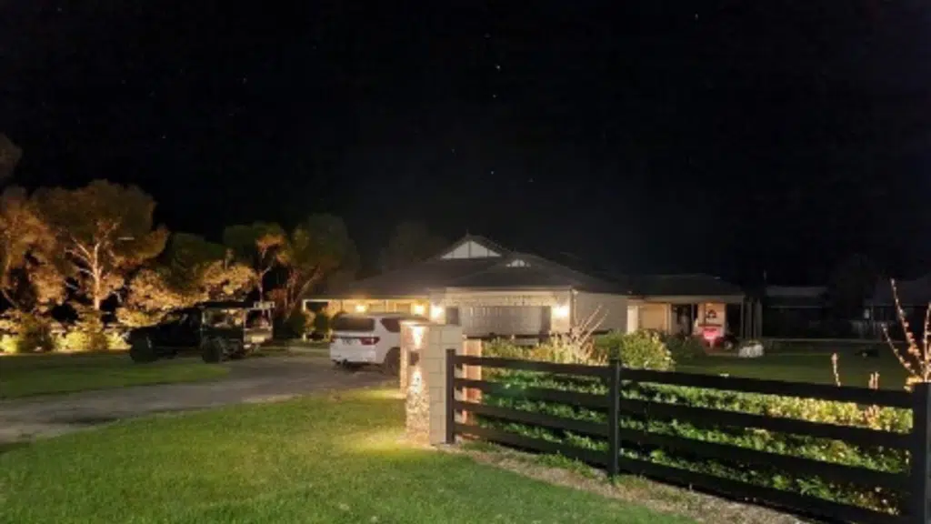 Brick entrance - fence install- premium steel post and rail